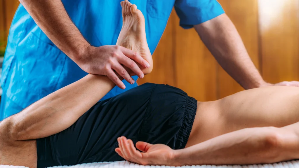 Male Client Getting Sports Massage