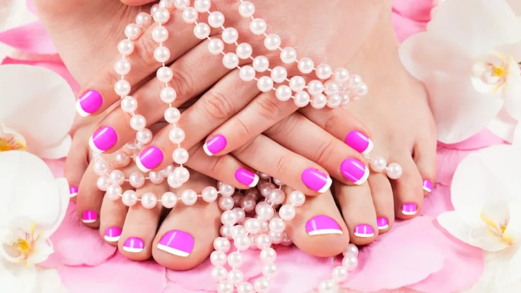 woman happy with her mani pedi and showing how amazingly the expert worked on her